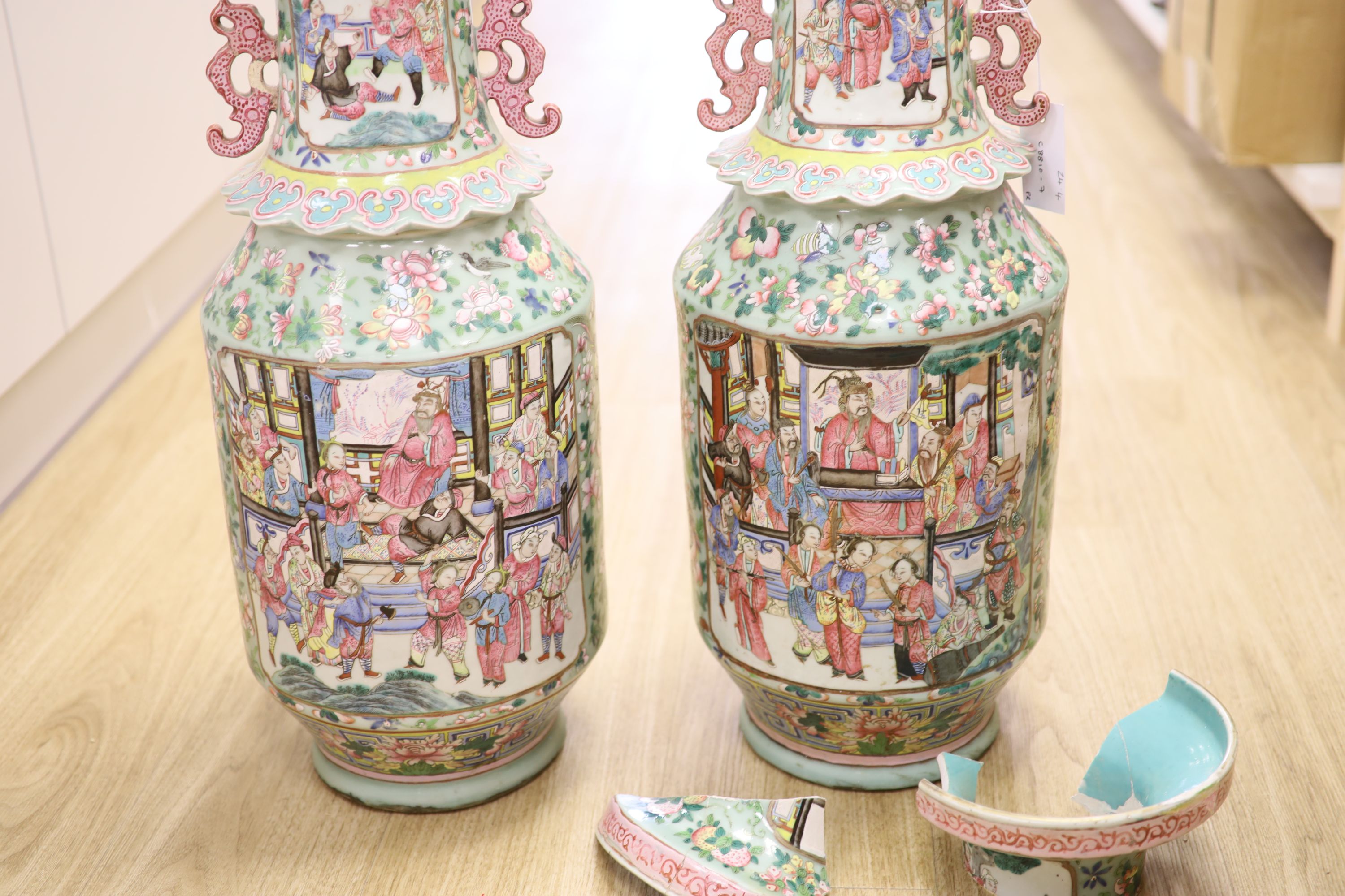 A pair of 19th Chinese famille rose vases, height 63cm (a.f.)